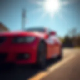 Red vehicle parked under a bright sun