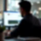 A person analyzing auto insurance quotes on a computer screen