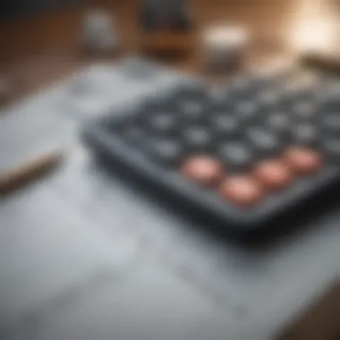 A close-up of a calculator and financial documents