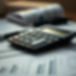 A calculator and financial documents representing budgeting.