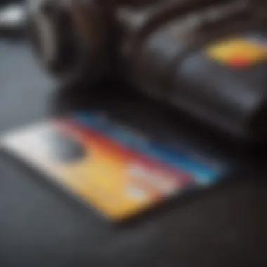 Close-up of a credit card next to travel gear.