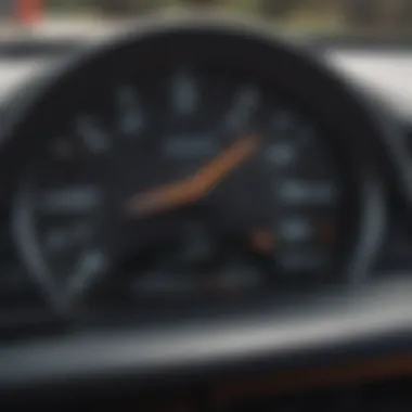 A close-up of a vehicle dashboard showing low mileage.